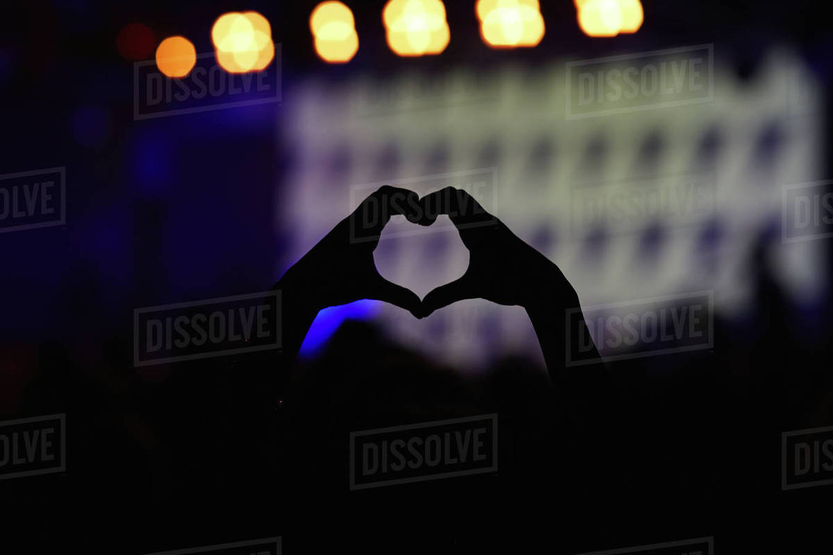 Close-up of heart shaped hands at concert Royalty-free stock photo