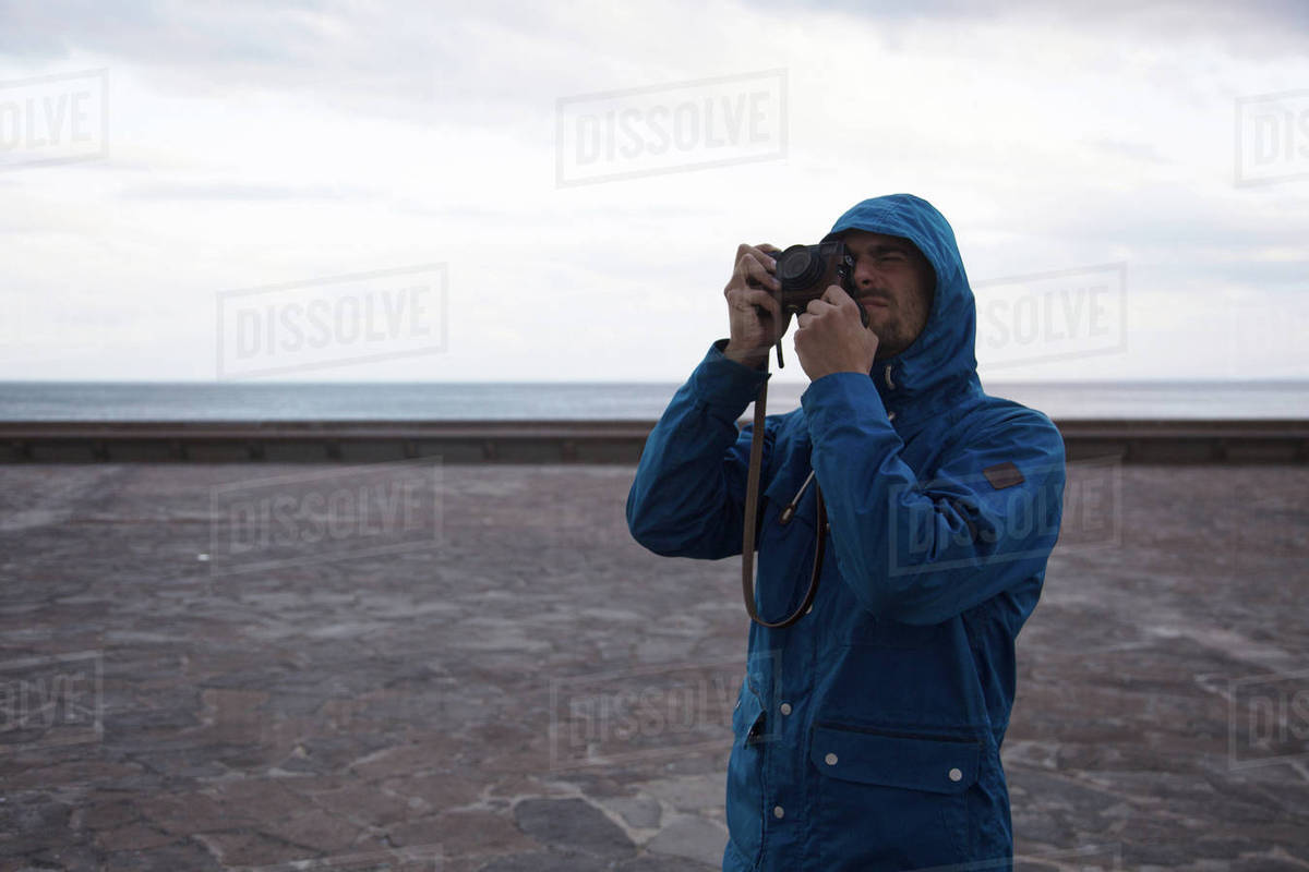 Traveling man taking photos during journey Royalty-free stock photo
