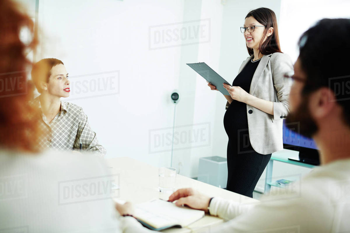 Happy managers listening to teacher at seminar Royalty-free stock photo
